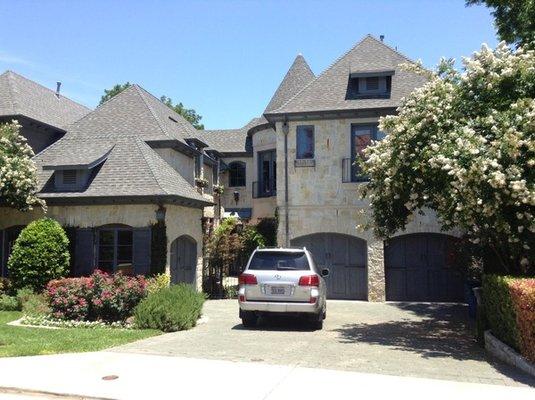 A roof replacement with intricate structural details.