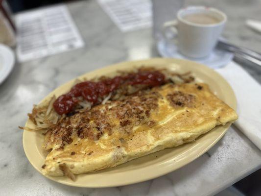 3 egg omelet and hash browns  with coffee . Delicious and enough for 2 .