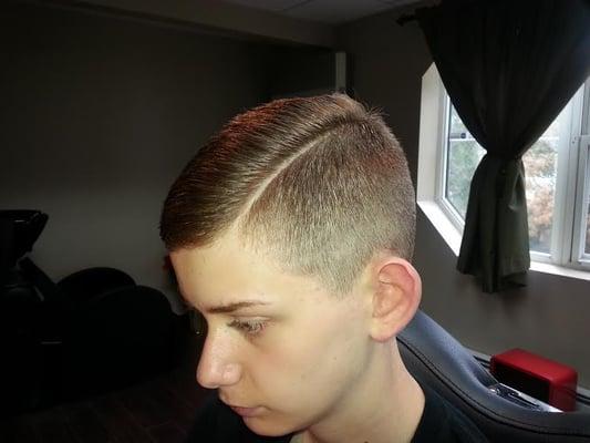 Comb over fade with part cut in on Joe by Christina at Barbers & Songs!