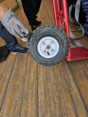 Busted tire causing dolly to be unusable.