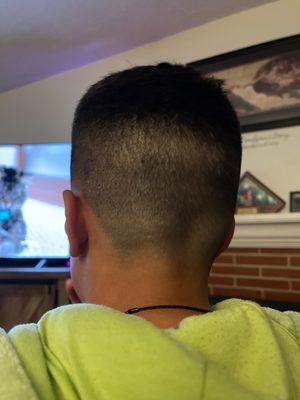 Back of my son's head where the fade wasn't blended in