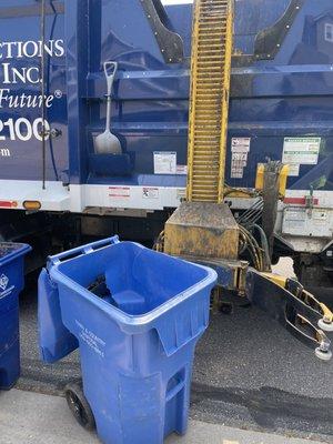 Arm stuck in trash can