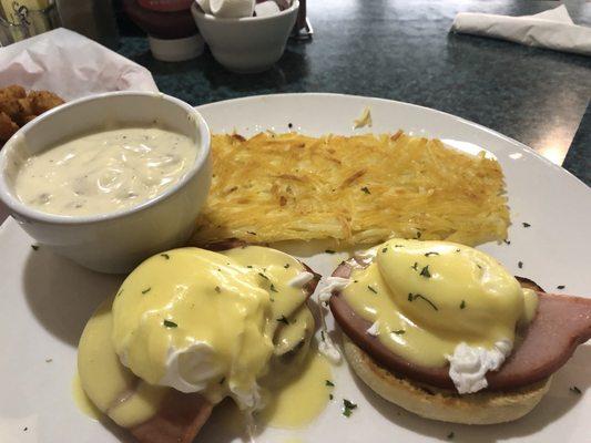 Eggs Benedict with a side of sausage gravy