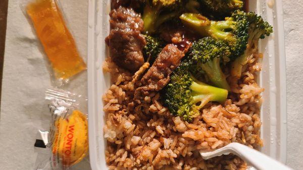 Beef and broccoli with fried rice.