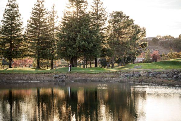 Walking along the lake on the golf course