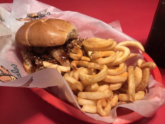 Pull pork sandwich with curly fries