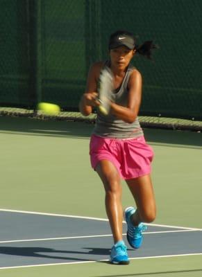 Elise cracks a backhand in April ATAAZ  Shootout Tournament.