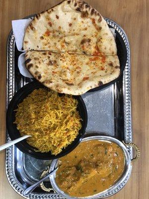 Huge naan with chicken korma and lamb biriyani