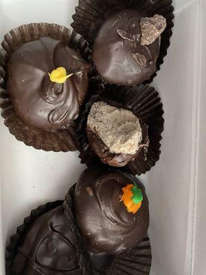 Two tiramisu truffles, lemon dark chocolate, pumpkin, and maple!