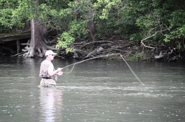 Trout fishing on the East Fork of the Whitewater River is only blocks away from the Brookville Lodge.