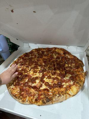 The extra giant pizza.