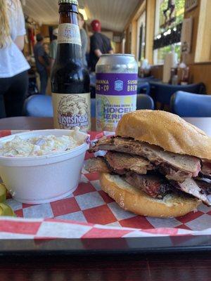 Signature Smoked Brisket Sandwich and Coleslaw. Lions Head Root Beer and Susquehanna Brewing IPA