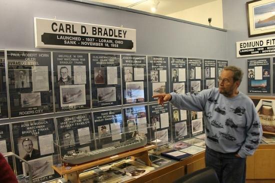 Retired Chief Engineer and Great Lakes Lore Museum volunteer Dick Adair explaining the Carl D. Bradley exhibit.