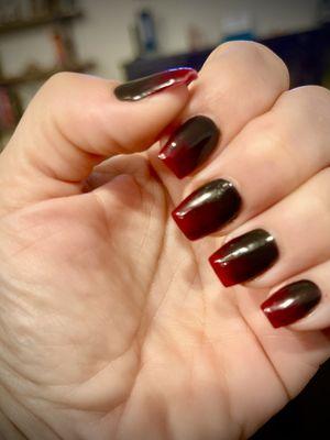 A little goth for me!  Loving this black to red ombré style with the coffin shaped nails.  Definitely en vogue!  Perfection!