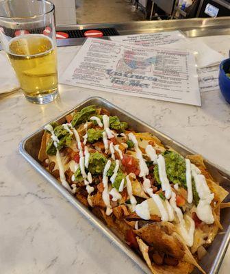 pork nachos on happy hour menu, good