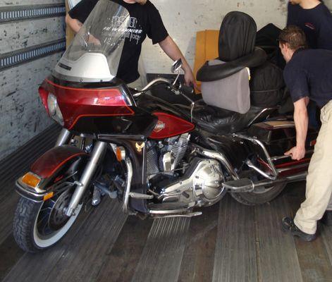 Motorcycle transport. Load and then protect during shipping.