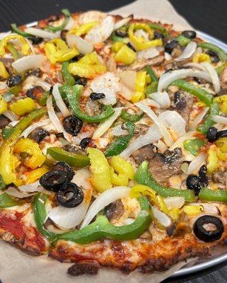 Corrected Cauliflower Garden pizza without the plant-based sausage, added black olives and banana peppers