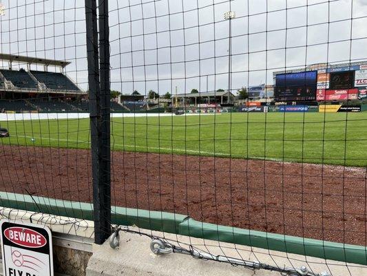 Netting blocking entire foul area.