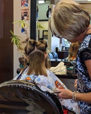 Lisa chopping my baby girls hair as she requested