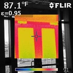 Thermal image of south exposure to commercial entrance doors.