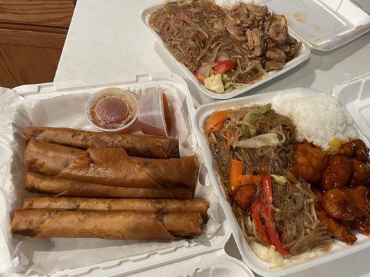 Lumpia orange chicken pancit rice and adobo.