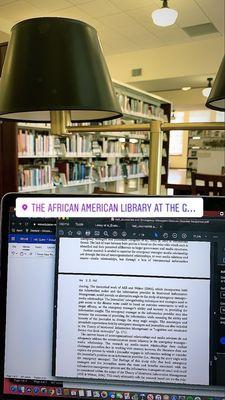 cute study nook behind books on 2nd floor