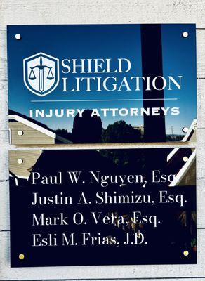 Shield Litigation Sign