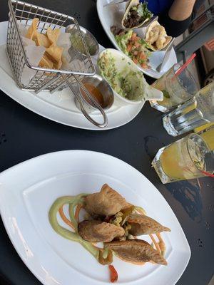 Empanadas and guac with chips