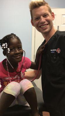 Patient Listening to Employee's Heart