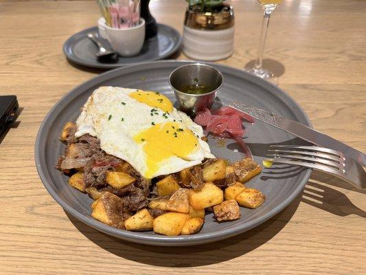 So good! SHORT-RIB AND POTATO HASH -  two sunny side eggs, caramelized onions,peppers,chimichurri