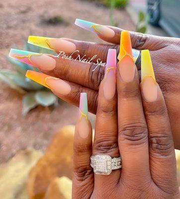 Sunset-inspired ombré with pastel tips and golden lightning accents. #SunsetNails #OmbréWithATwist