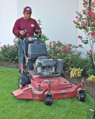 Lawn mowing, fertilization, sprinkler repair and landscaping