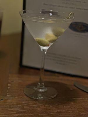 DIRTY MONICA For those of you who like little "dirty"! Vodka martini with just enough olive brine.