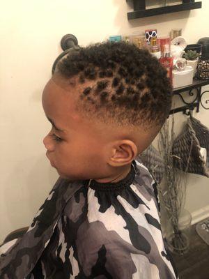 Boys haircut (fade) with twist