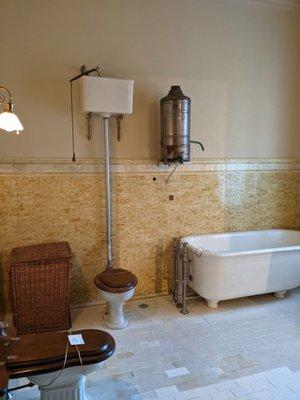 That's a hot water heater over the bath tub