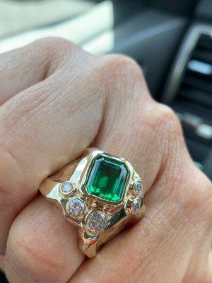 Gold, diamond and emerald ring.