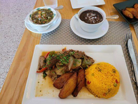 Ropa Viejo is shedded slow cooked beef with onions, green, red peppers in cuban sauce. Yummy!