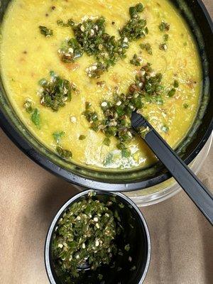 Dal Tadka, adding very hot peppers.