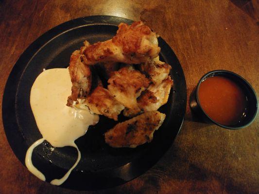 Wings, buffalo sauce, and ranch dressing.