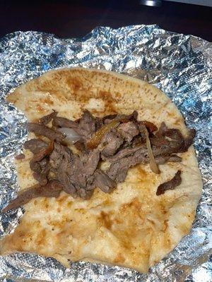 A mediocre over salted asada taco