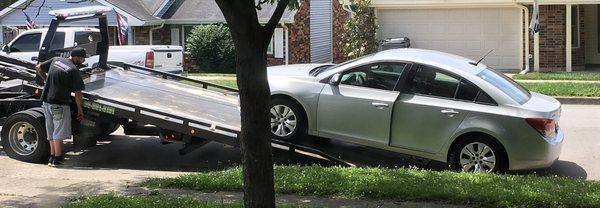 The car less than 24 hours after purchasing being towed away.