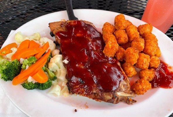 1/2 rack of ribs, tater tops, and steamed veggies