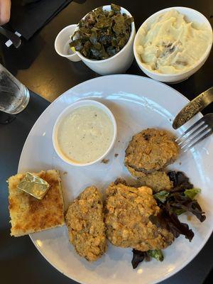 Fried steak, cornbread, collard greens, mashed potatoes and gravy.