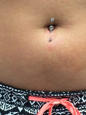 Upper and lower navel piercing! Very clean and modern shop. Only uses the best jewelry and supplies.