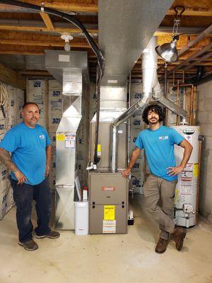 Mike & Ernesto install a new Coleman HVAC system.