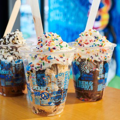 Three ice cream sundaes in the Ben & Jerry's ice cream shop.