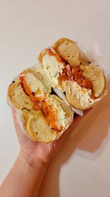 Lox and scallion cream cheese on onion bagel