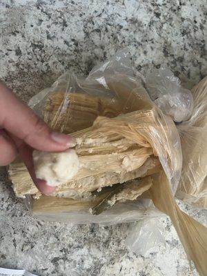 Proof of the tamales being RAW! So raw I could mold the masa in a ball. Proof with the receipt in the photos.