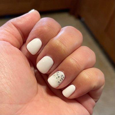 Gel manicure for my honeymoon. Ann did a great job recreating the sparkles on my ring finger from a photo I showed her :)