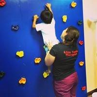 Physical Therapy fun with our indoor climbing wall!